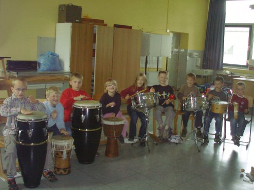 Kindergarten projektwoche fortbildung schlagzeugunterricht  trommelkurse schlagzeug lernen ferienkurse trommelworkshop drums percussion schlagzeugschule trommelunterricht trommelgruppe ferienkurse leichlingen leverkusen langenfeld wermelskirchen burscheid solingen Kinder jugendliche erwachsene  schlagzeug conga djembe cajon bongos rhythmus unterricht afrikanisches trommeln bodypercussion